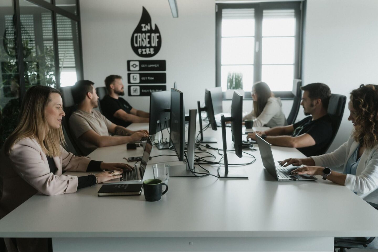 Q team working on AI compliance.